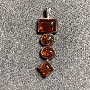 Amber pendant set in .925 silver